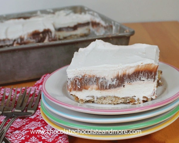 Fat Man's Delight-luscious layers of cheesecake filling, chocolate pudding and cool whip all on top of a pecan crust. Can easily be made low sugar/calorie.