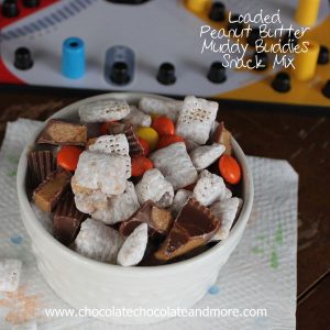 Loaded Peanut Butter Muddy Buddies Snack Mix-with Reeses Pieces and Reeses Peanut Butter Cups your family will eat it up!
