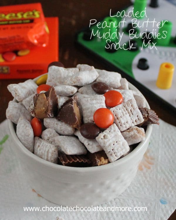 Loaded Peanut Butter Muddy Buddies Snack Mix-with Reeses Pieces and Reeses Peanut Butter Cups your family will eat it up!