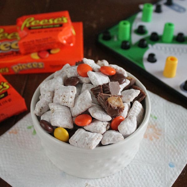 Loaded Peanut Butter Muddy Buddies Snack Mix-with Reeses Pieces and Reeses Peanut Butter Cups your family will eat it up!