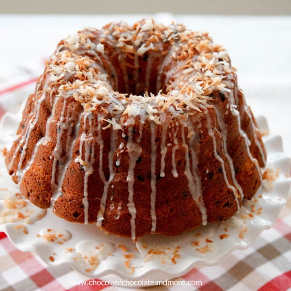 Chocolate Chip Coconut Bundt Cake-Bursting with mini chocolate chips, combined with sweet flaked coconut then topped with a simple glaze and toasted coconut.