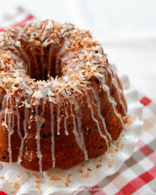 Chocolate Chip Coconut Bundt Cake-Bursting with mini chocolate chips, combined with sweet flaked coconut then topped with a simple glaze and toasted coconut.