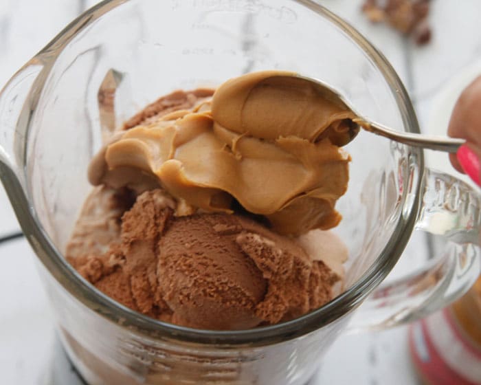 Chocolate Ice Cream, Peanut Butter and Milk in a Cuisinart blender