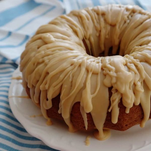 Caramel Glazed Spice Cake-start with a simple yellow box mix then with the addition of spices and a sweet caramel glaze you have something that will rival any cake made from scratch!
