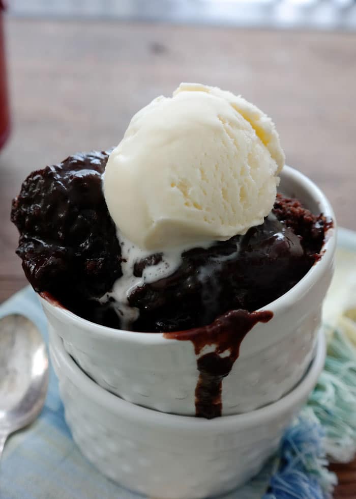 Slow Cookier Chocolate Lava Cake-dust off the slow cooker for this warm cake with a molten chocolate bottom, top with a scoop of vanilla ice cream for the ultimate dessert!