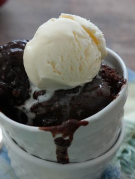 Slow Cooker Chocolate Lava Cake-dust off the slow cooker for this warm cake with a molten chocolate bottom, top with a scoop of vanilla ice cream for the ultimate dessert!