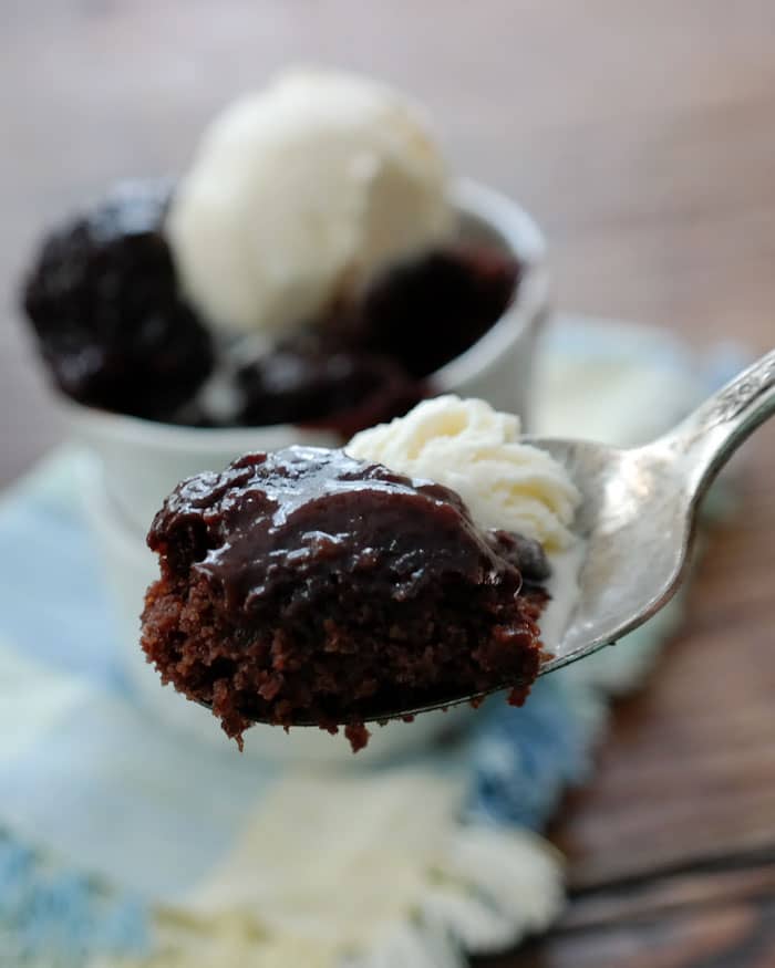 Slow Cooker Chocolate Lava Cake-dust off the slow cooker for this warm cake with a molten chocolate bottom, top with a scoop of vanilla ice cream for the ultimate dessert!