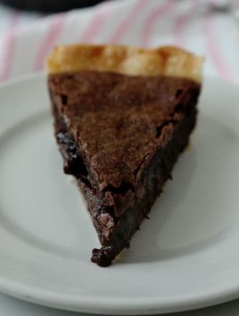 Easy Brownie Pie-taking brownies to the next level and creating an easy dessert-a flaky pie crust surrounds a rich brownie with a thin crust on top and in the middle a gooey, fudgy delight!