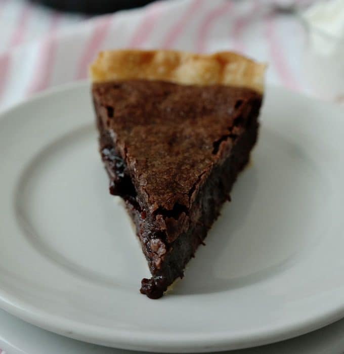 Easy Brownie Pie-taking brownies to the next level and creating an easy dessert-a flaky pie crust surrounds a rich brownie with a thin crust on top and in the middle a gooey, fudgy delight!