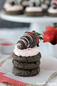 You might not want to share these Chocolate Covered Strawberry Cookies. These cookies start with a chocolate cake mix cookie, then they are layered with a Strawberry Swiss Meringue Buttercream and topped with a chocolate covered strawberry. I could not think of a better dessert to keep all to myself.