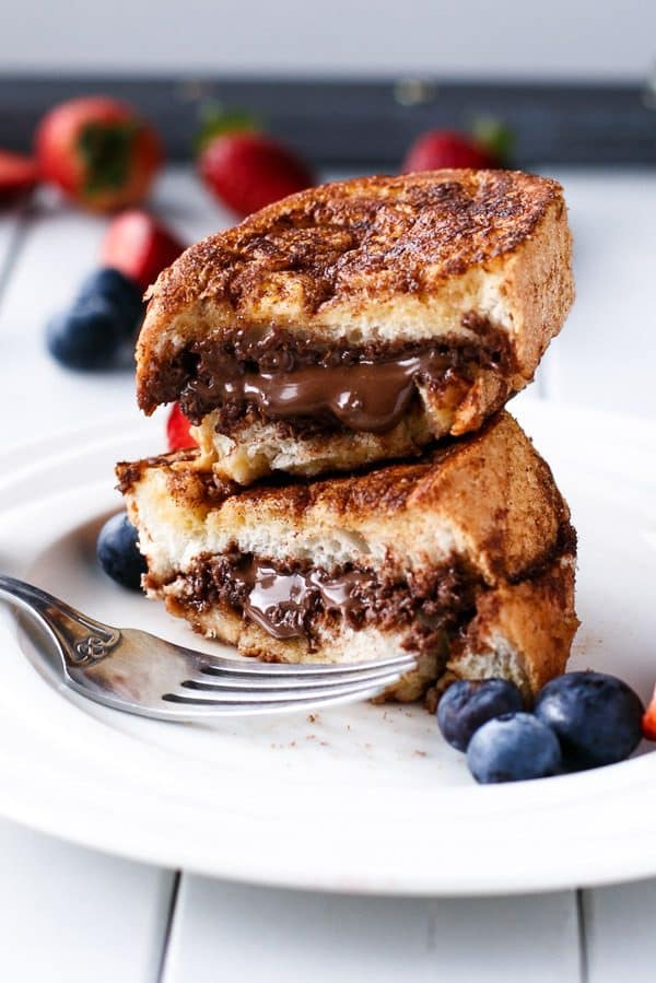 Nutella Stuffed Churro French Toast by cafedelites.com