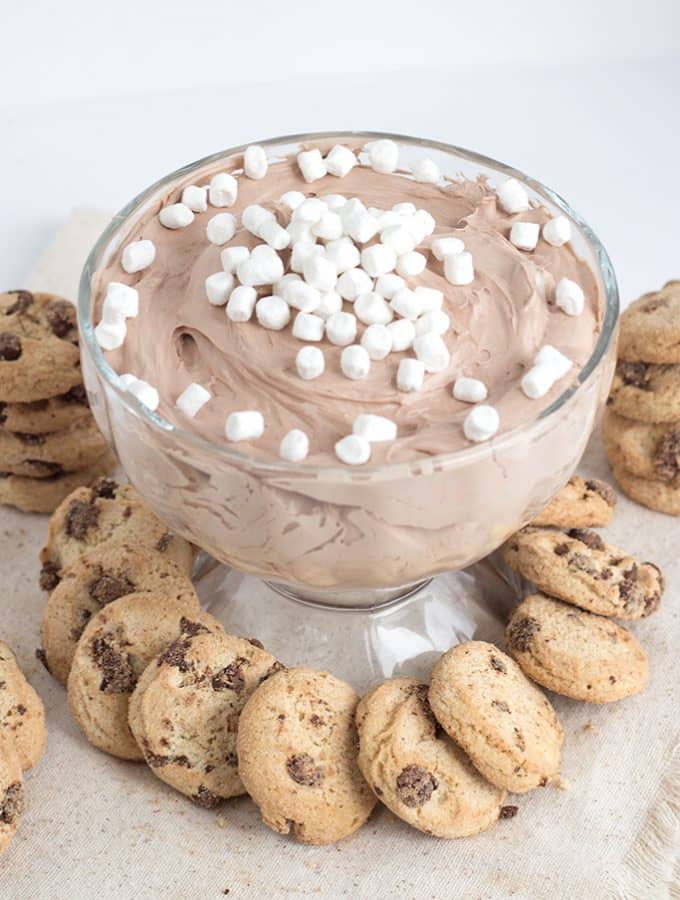 Hot Cocoa Cheesecake Dip - The perfect dip for your cookies! It's filled with tiny marshmallows and hot cocoa flavor. It has the perfect mousse texture too!