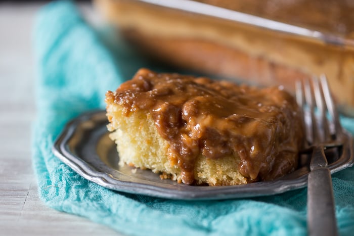 This super simple salted caramel butterscotch poke cake is packed full of flavor and ready in no time. You'll love this semi homemade treat!