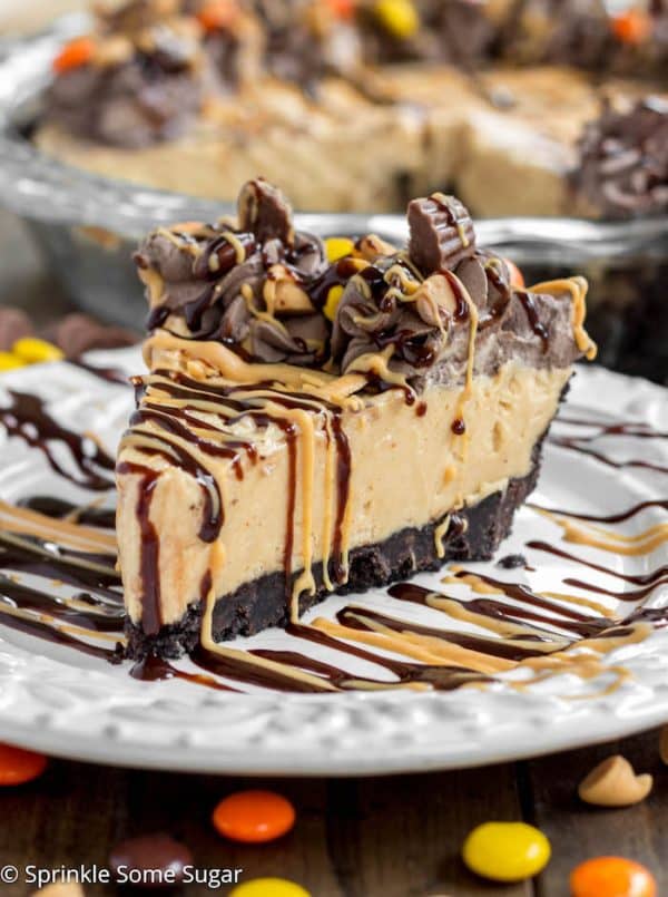 Easy Peanut Butter Pie - A creamy peanut butter pie filling is nestled in an Oreo crust and topped with a dark chocolate whipped cream.