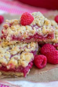 Raspberry Lemon Crumble Bars - A super easy recipe for sweet and tart raspberry lemon crumble bars!