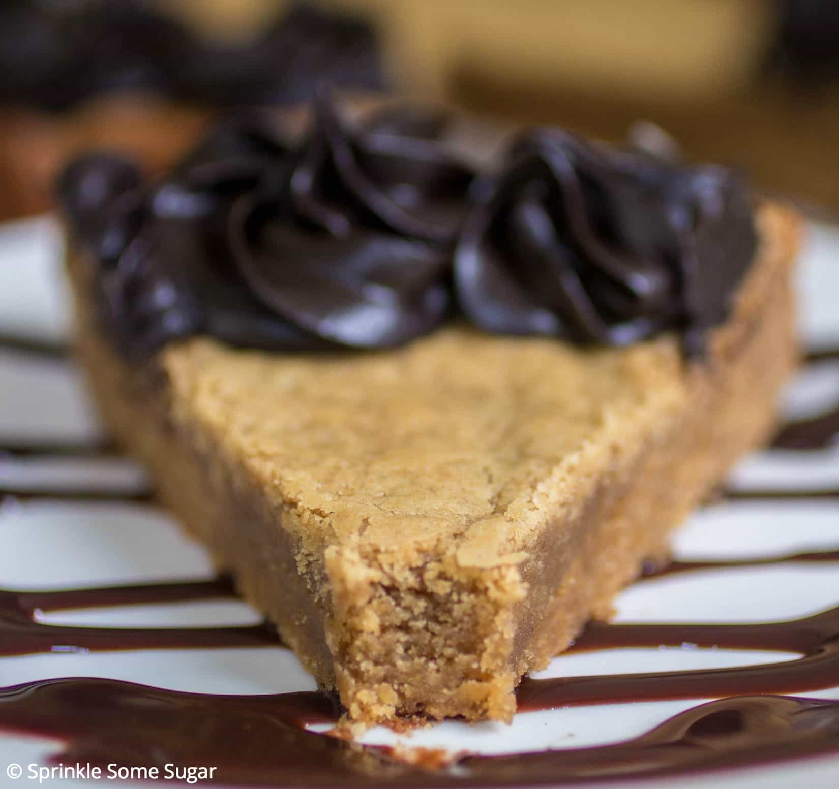 Peanut Butter Cookie Cake - A thick, chewy peanut butter cookie cake topped with a creamy dark chocolate frosting.