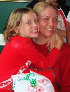 Grace Hayes and Joan Hayes hugging.