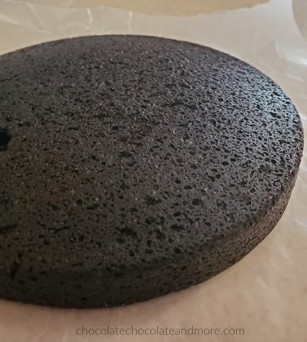 a single layer of 2 ingredient oreo cake cooling on a counter