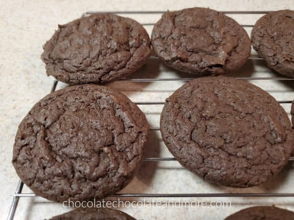 dark chocolate cookies cooling on a wire rack