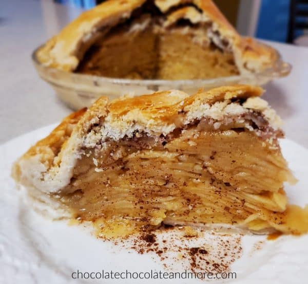 a slice of apple pie dripping with cinnamon