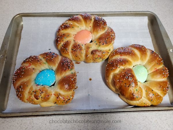 three braids of bread with Easter eggs