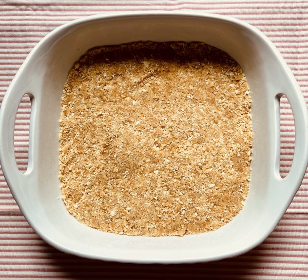 Banana Pudding Bars crust in a dish.