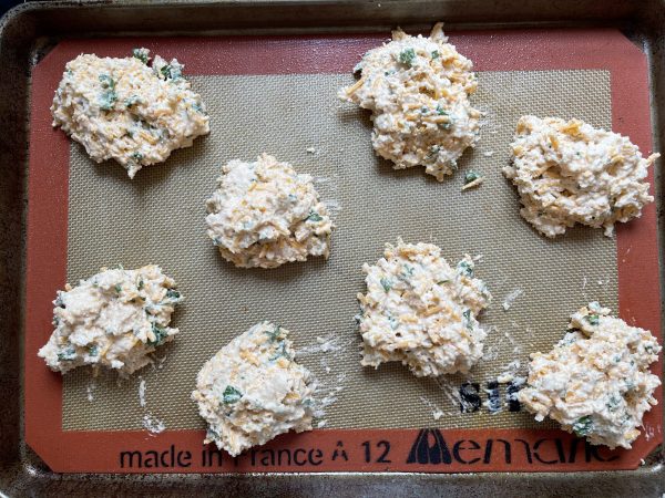 Copycat Red Lobster Cheddar Bay Biscuits Remake batter balls on a baking sheet