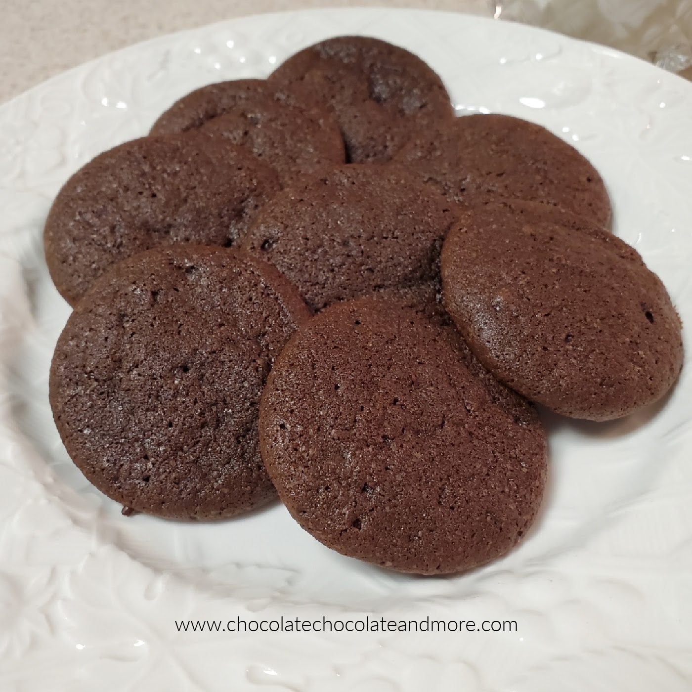loads of chocolate cookies on a white plate