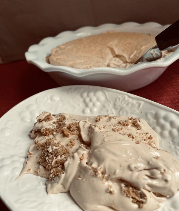Caramel Pie Pudding Caramel Pie Pudding scooped onto a decorative plate