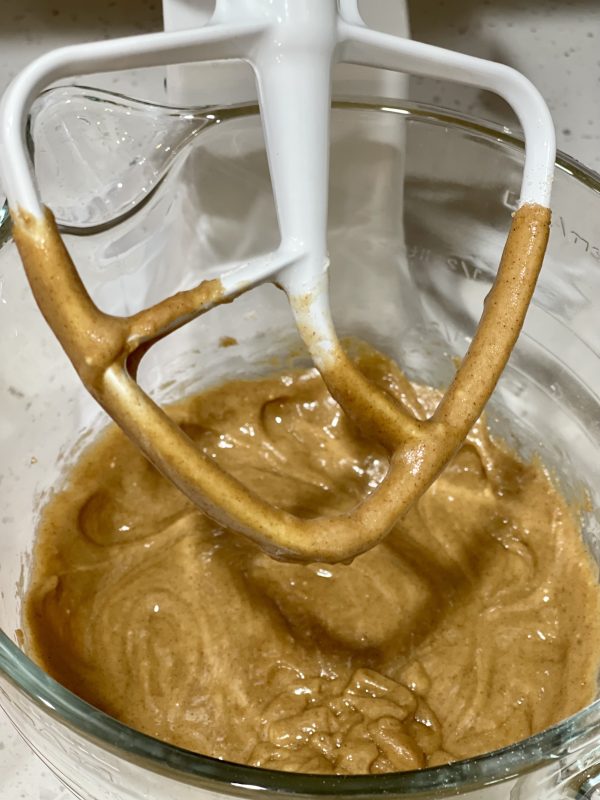 Carrot Cake Loaf Wet and dry ingredients mixed together in the glass mixing bowl.