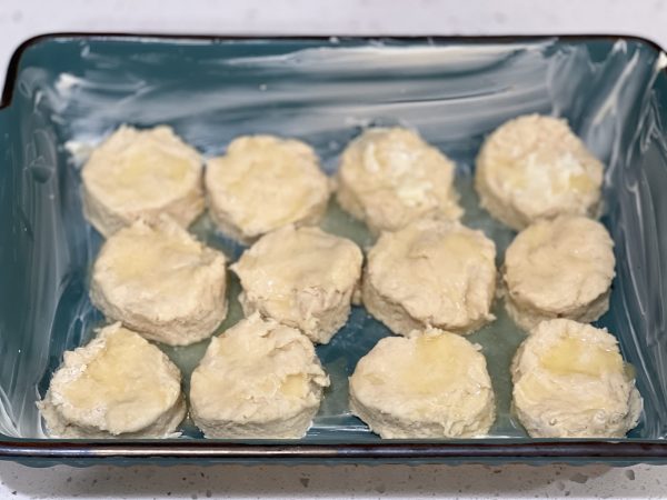 Chocolate Gravy Covered Buttermilk Biscuits dough in a buttered baking dish