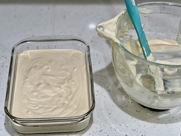 No-Churn Peanut Butter Coffee Ice Cream poured into container