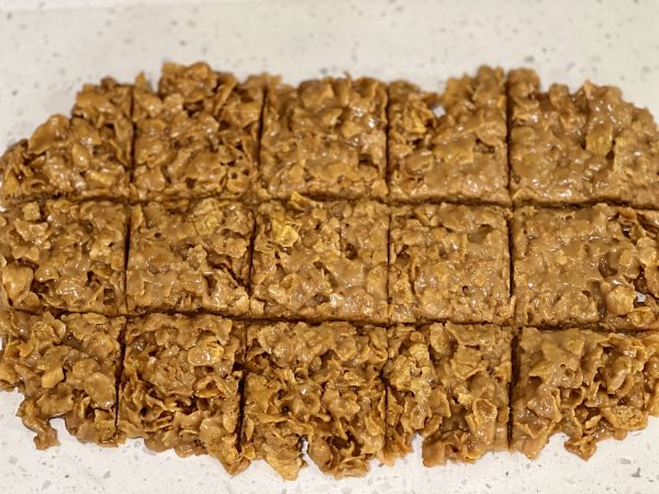 Peanut Butter Corn Flake Candy cut into squares