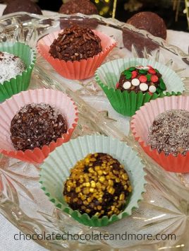 several decorated chocolate balls in paper wraps