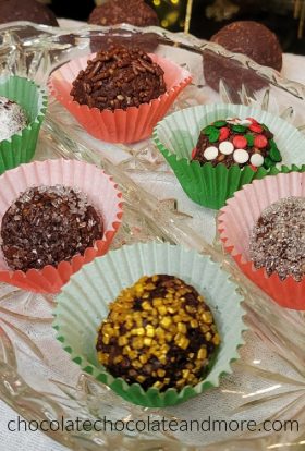 several decorated chocolate balls in paper wraps
