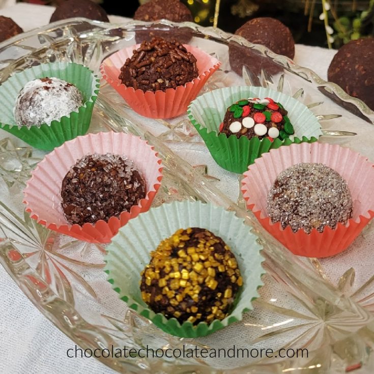 several decorated chocolate balls in paper wraps
