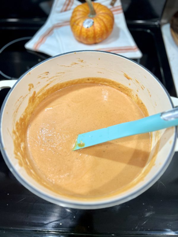 Creamy Pumpkin Soup in a pot on the stove