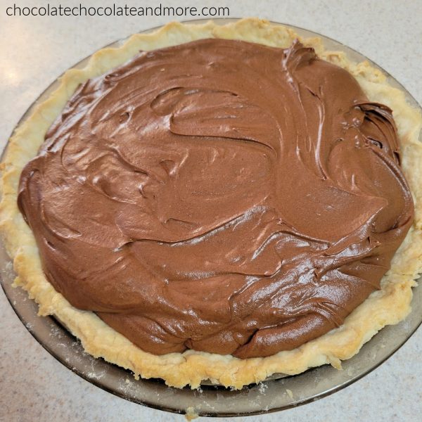 a whole chocolate pie before being topped with whipped cream