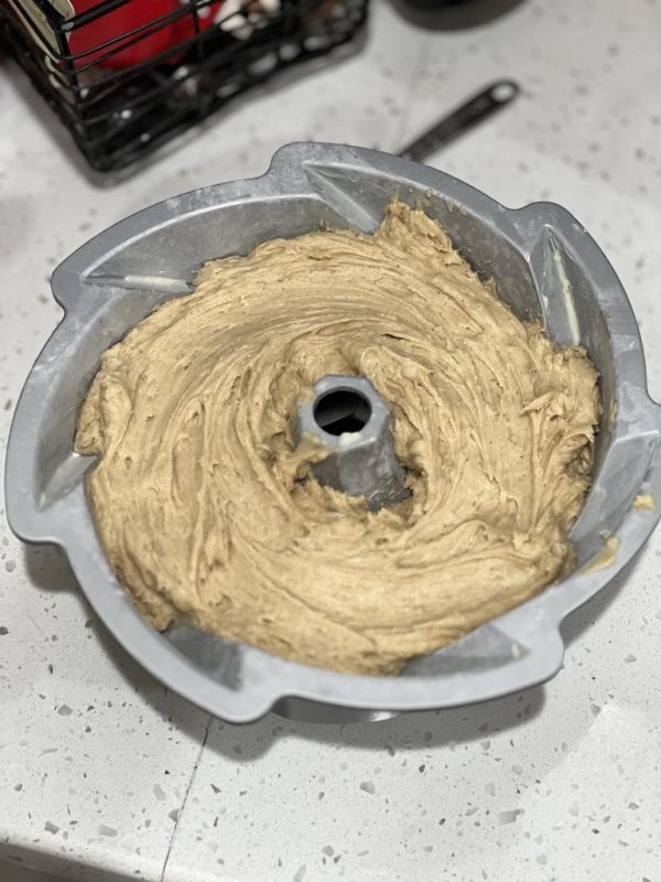 Batter spread into a bundt pan